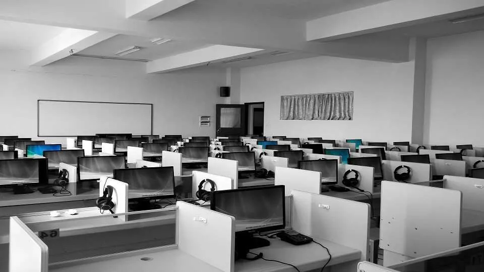 Rows of computers in a cubicle